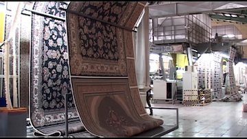 گره ناگشوده بر تار و پود فرش ماشینی